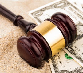 Gavel and money on the desk of a White Plains consumer bankruptcy attorney in New York.