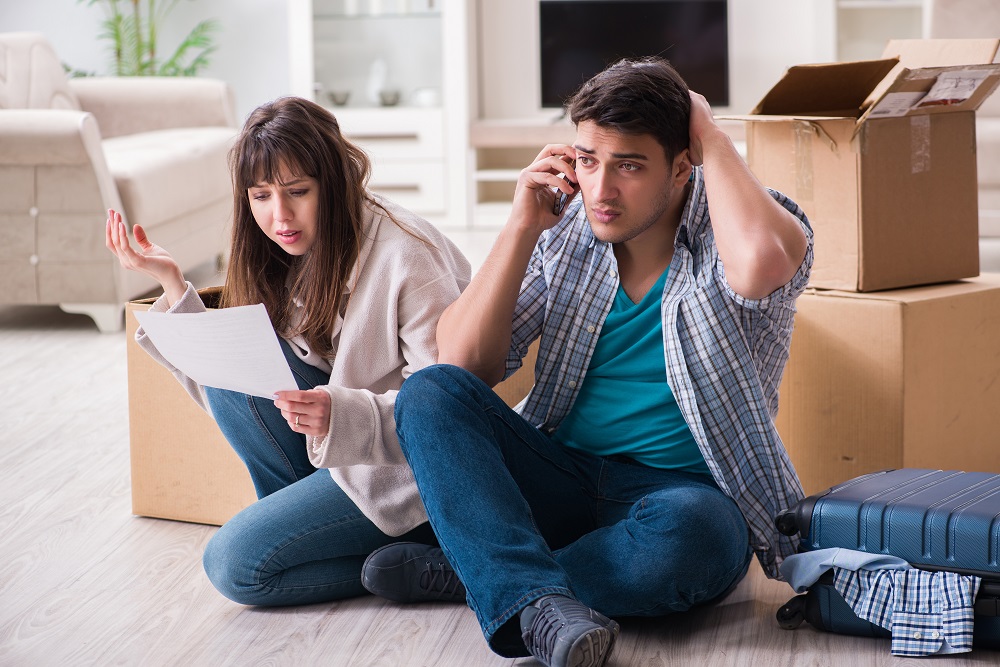 Worried young couple received foreclosure notice.